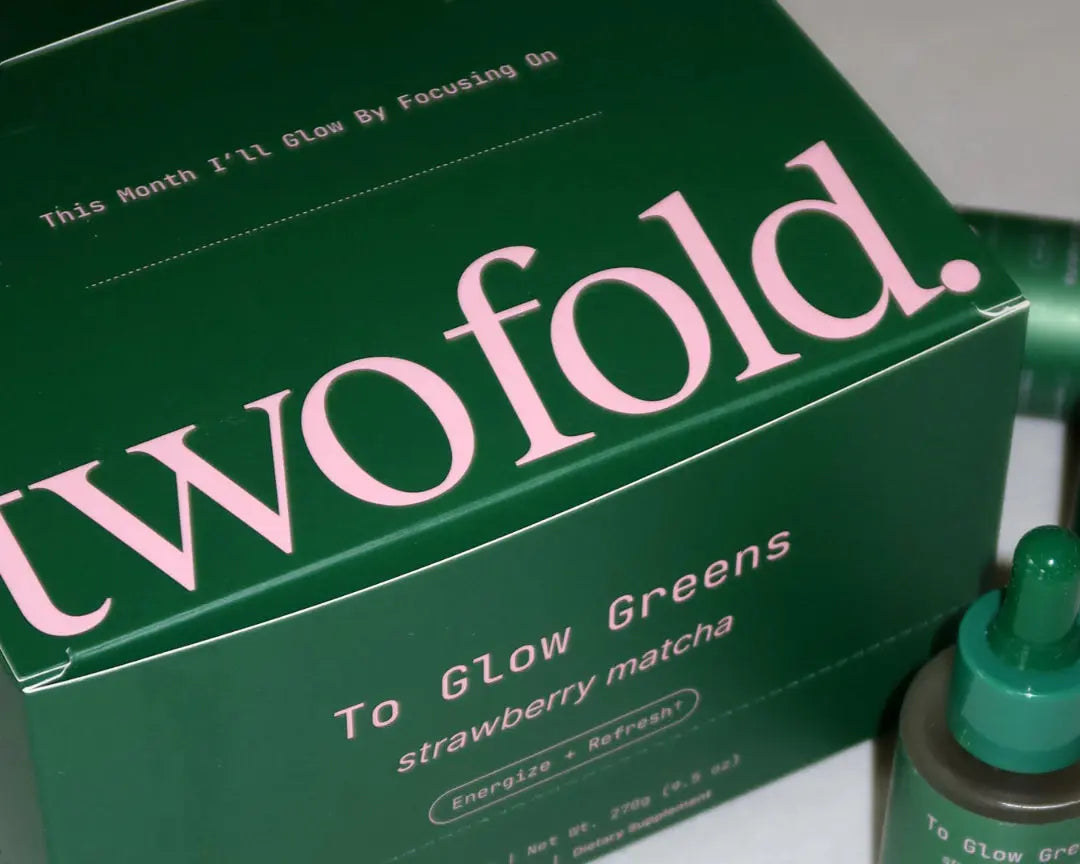 Green box with 'twofold' branding and a dropper bottle on a white background